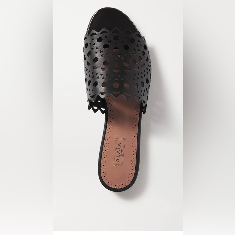 New Alaïa
Lasercut Leather Slide Sandals